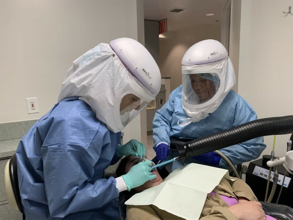 Clinical team wearing MAXAIR CAPR powered air purifying respirators